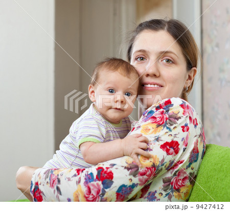 Happy mother with her baby 9427412