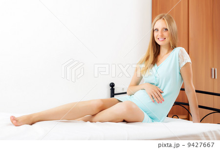 Cheerful pregnant woman Cheerful pregnant woman 9427667