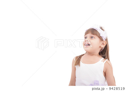 cute little girl very surprised and looking up somewhere against cute little girl very surprised and looking up somewhere against 9428519