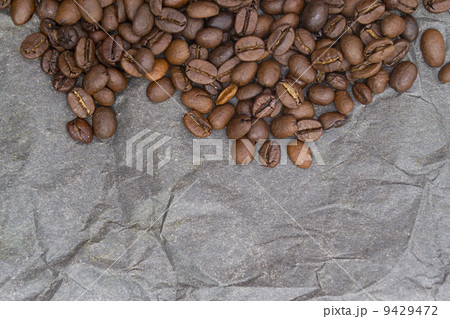 Brown background pattern from coffee grains 9429472