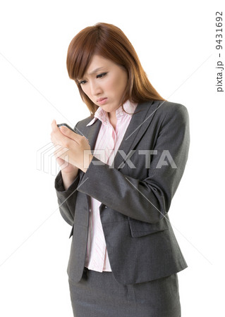 Angry businesswoman talk on phone 9431692