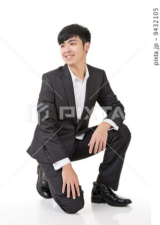 Asian Business Man Squatの写真素材