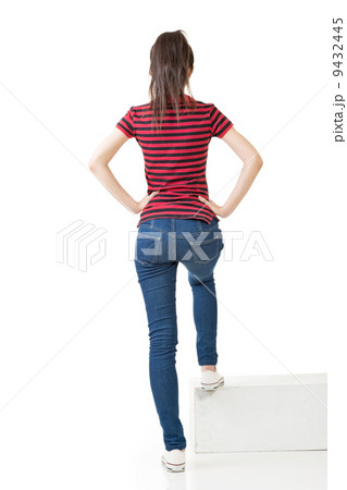 Full legth portrait of asian woman on stairs Full legth portrait of asian woman on stairs 9432445