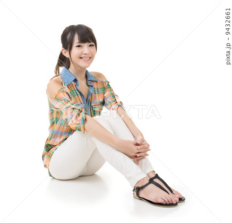 Happy smiling asian woman sit on ground Happy smiling asian woman sit on ground 9432661