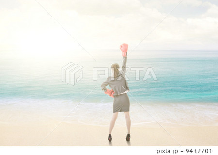 Asian business woman with boxing gloves 9432701