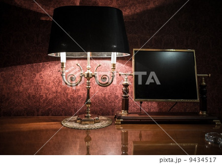 Lamp and lcd screen in vintage style interior 9434517