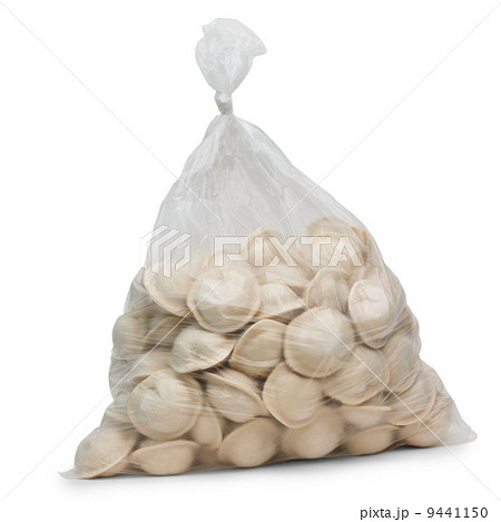 raw dumplings in plastic cellophane bag isolated on white backgr 9441150