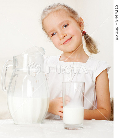 Child with glass pitcher milk Child with glass pitcher milk 9444215