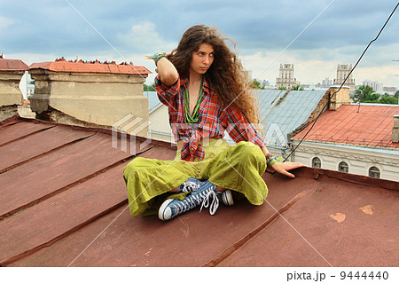 Girl on a roof 9444440