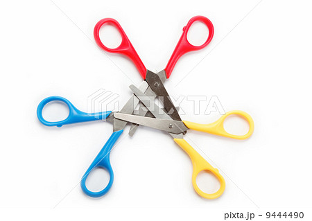 Three colorful scissors in blue yellow and red isolated over whi 9444490