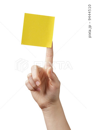 female teen hand holding sticky note female teen hand holding sticky note 9444510