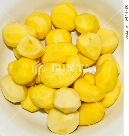 Raw potato background. Raw potato background. 9444780