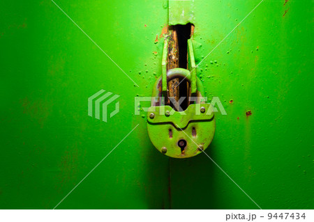 old padlock on the iron green texture 9447434