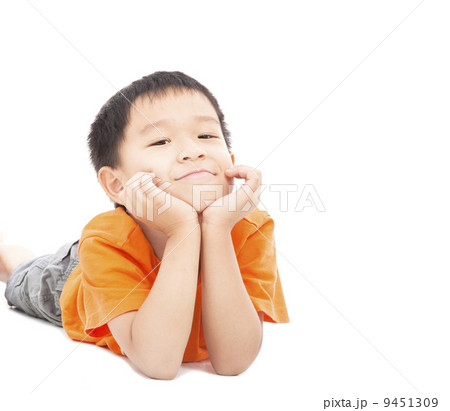 asian boy lying on floor isolated on white asian boy lying on floor isolated on white 9451309