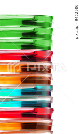 Stack of colorful Petri dishes isolated Stack of colorful Petri dishes isolated 9452986