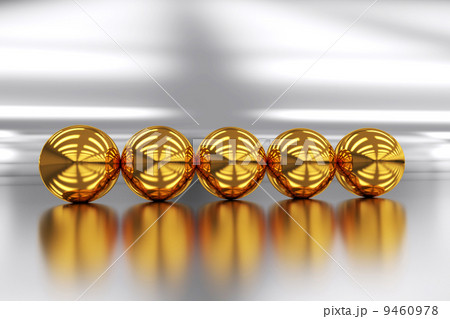 five golden balls on the mirror surface five golden balls on the mirror surface 9460978