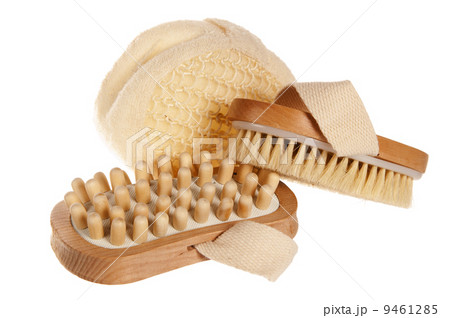 Bast and massage brush, it is isolated on white 9461285