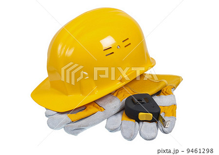 Tools and helmet of the builder, it is isolated on white Tools and helmet of the builder, it is isolated on white 9461298