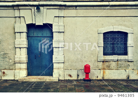Facade of typical venetian house. 9461305