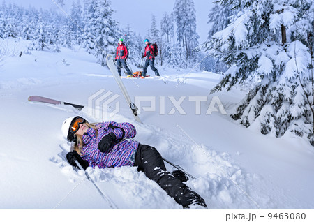 Injured skier after accident waiting for rescue Injured skier after accident waiting for rescue 9463080