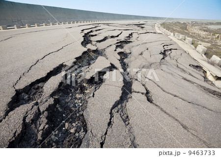 cracked road after earthquake 9463733