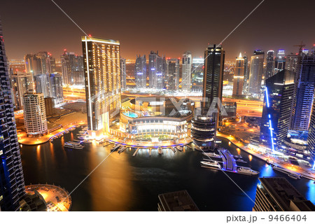 DUBAI, UAE - SEPTEMBER 8: The night illumination of Dubai Marina on September 8, 2013 in Dubai, UAE. 9466404