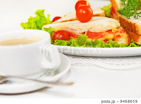 Eating on the run. Fresh and tasty home-made canape sandwiches 9468659