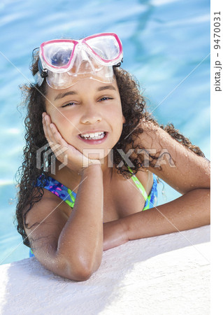 African American Mixed Race Girl Child In Swimming Pool 9470031