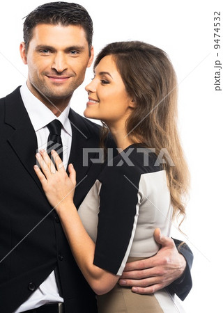 Beautiful young couple in suit and dress isolated on white background 9474532
