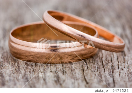 Wedding rings on a wooden background 9475522