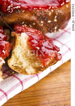 Sweet bread ( challah ) with strawberry jam Sweet bread ( challah ) with strawberry jam 9482042