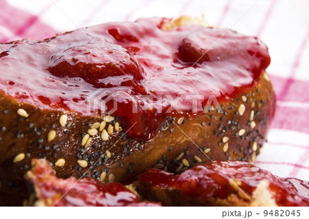 Sweet bread ( challah ) with strawberry jam Sweet bread ( challah ) with strawberry jam 9482045