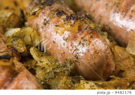 Roasted sausages with sauerkraut - polish dish 9482176