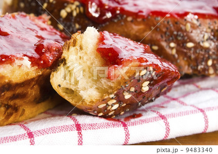 Sweet bread ( challah ) with strawberry jam Sweet bread ( challah ) with strawberry jam 9483340