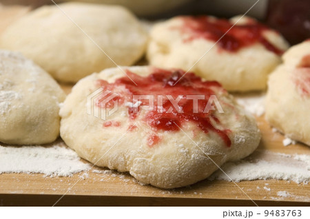 Sweet doughnuts with rose marmelade 9483763