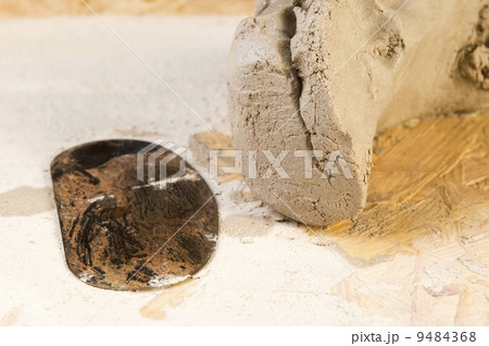 Clay with sculpting tool 9484368