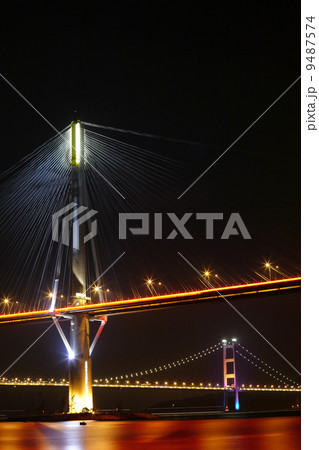 Ting Kau Bridge and Tsing ma Bridge at evening, in Hong Kong 9487574
