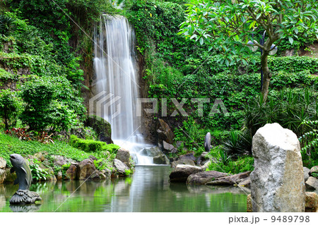 waterfall in park waterfall in park 9489798