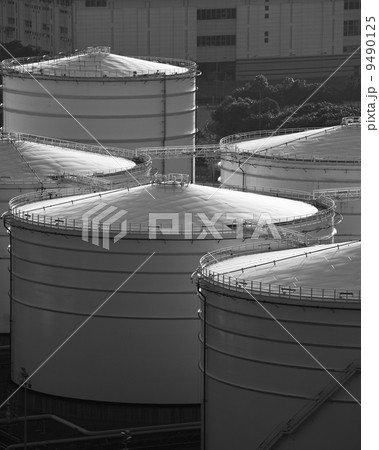 Monochrome oil tank in cargo service terminal Monochrome oil tank in cargo service terminal 9490125