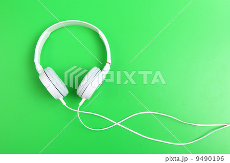 Headphone on green background 9490196