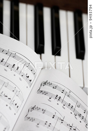 music sheet and piano 9493794