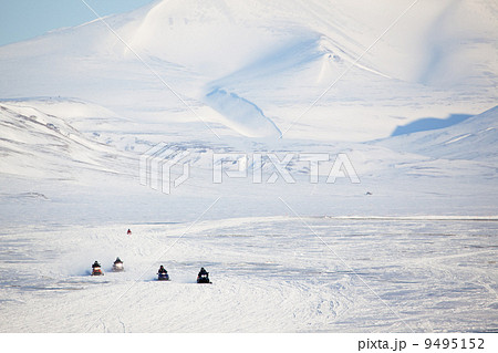 Snowmobile in Svalbard 9495152
