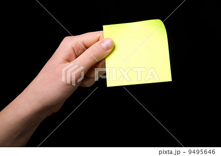 Holding a Sticky Note Holding a Sticky Note 9495646