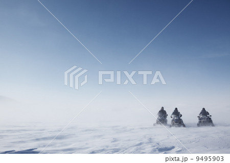 Snowmobile in Storm Snowmobile in Storm 9495903
