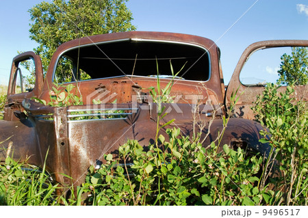 Overgrown Antique Car Overgrown Antique Car 9496517