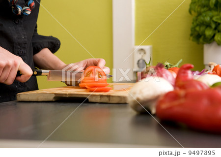 Cutting Tomatoes Detail Cutting Tomatoes Detail 9497895