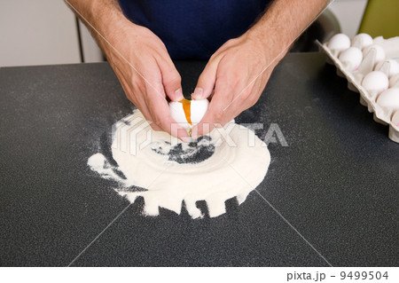 Making Pasta - Cracking the Egg 9499504