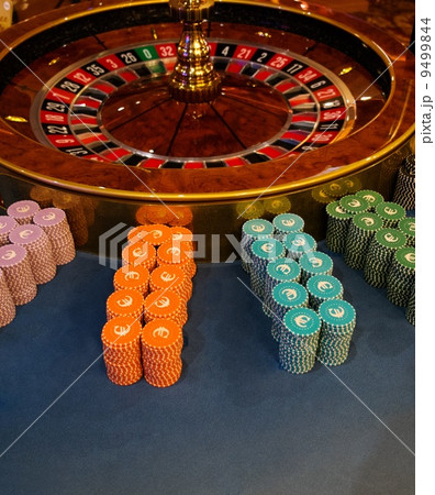 Gambling table with roulette in casino Gambling table with roulette in casino 9499844