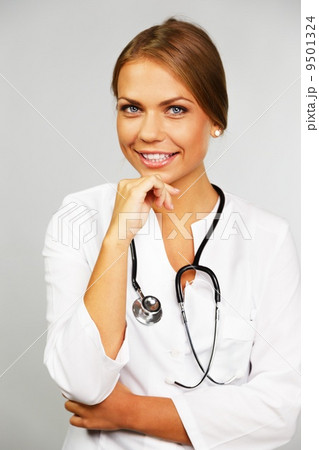 Beautiful young female doctor with stethoscope 9501324
