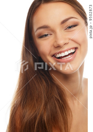 Young positive brunette girl with beautiful smile 9502873